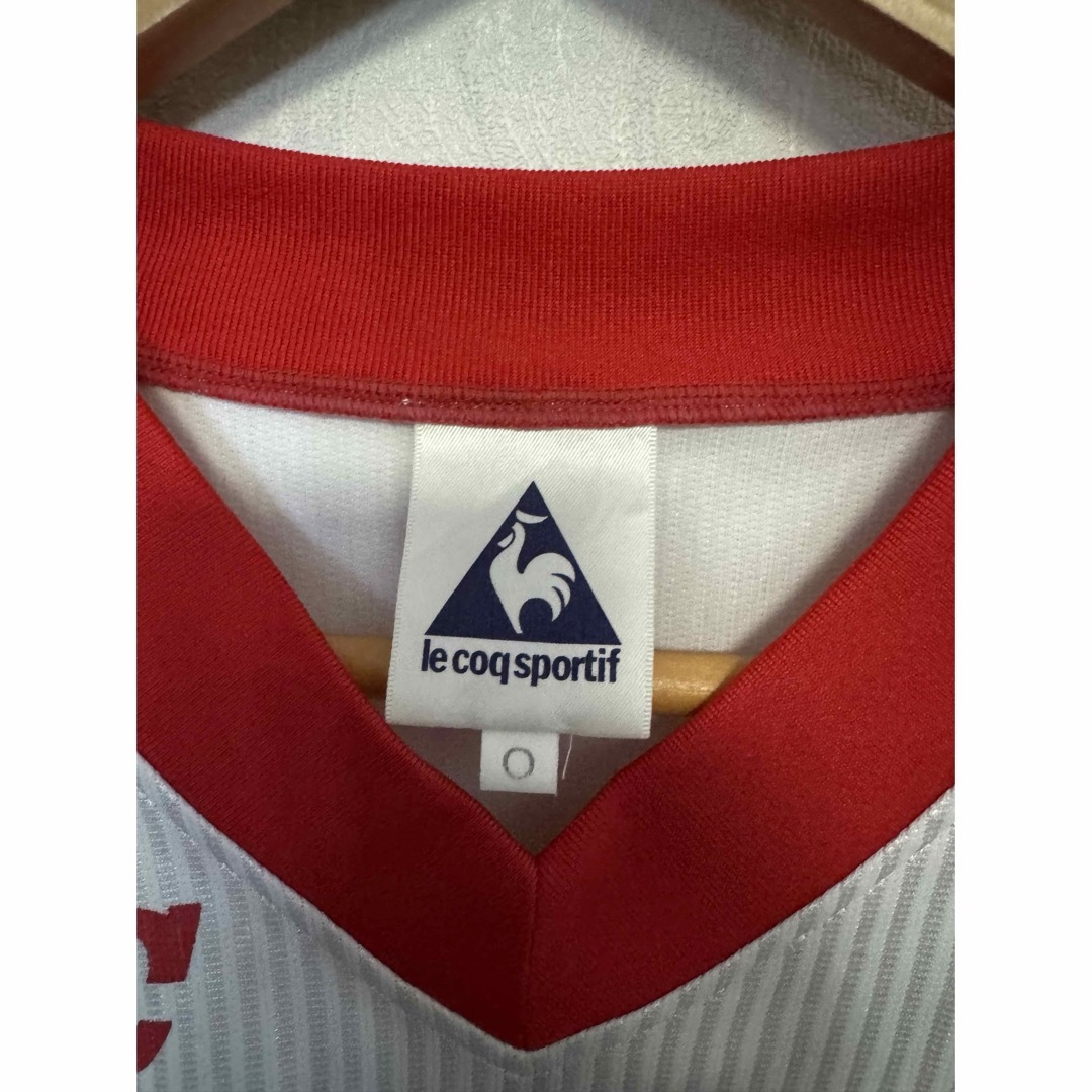 le coq sportif(ルコックスポルティフ)の名古屋グランパス ucc プラシャツユニホーム 練習着 Oサイズ ルコック スポーツ/アウトドアのサッカー/フットサル(ウェア)の商品写真