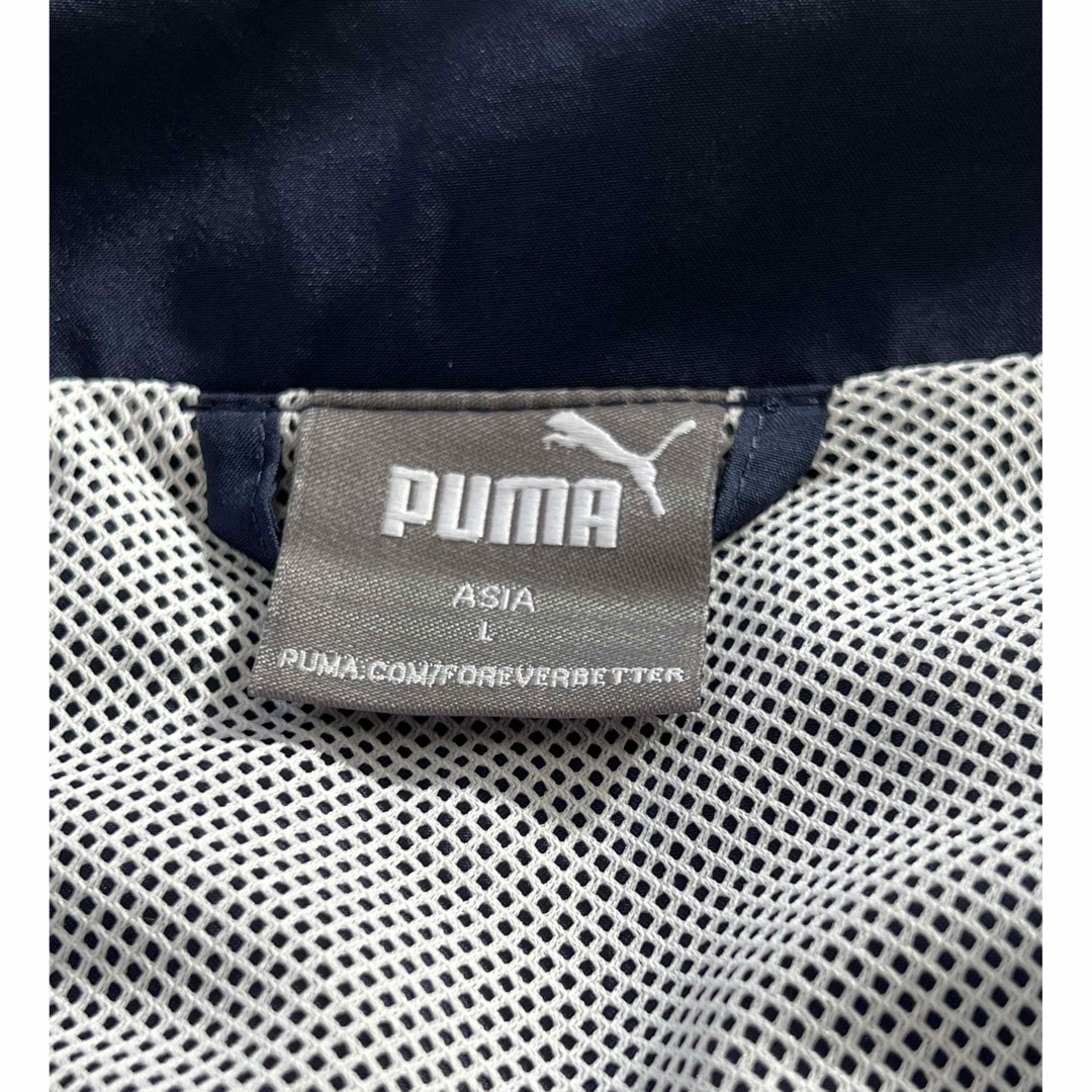 PUMA(プーマ)の新品！メンズ　PUMAウインドブレーカー上下セット　Lサイズ　ネイビー×ブルー メンズのトップス(ジャージ)の商品写真