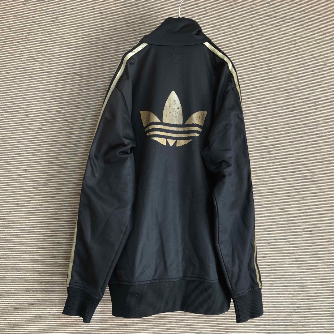 adidas(アディダス)の【アディダス】ジャージ　トラックジャケット　L黒タグ　金色　トレフォイルHY メンズのトップス(ジャージ)の商品写真