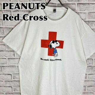 ギルタン(GILDAN)のPEANUTS ピーナッツ アメリカ赤十字レッドクロス献血Tシャツ 半袖 輸入品(Tシャツ/カットソー(半袖/袖なし))