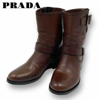 プラダ(PRADA)の美品 PRADA ショートブーツ オールレザー ベルト式 ブラウン 23㎝(ブーツ)