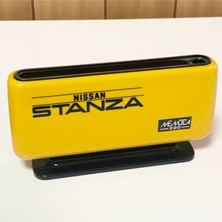 ニッサン(日産)の匿名配送　nissan stanza  MEMOCA220 イエロー(小物入れ)