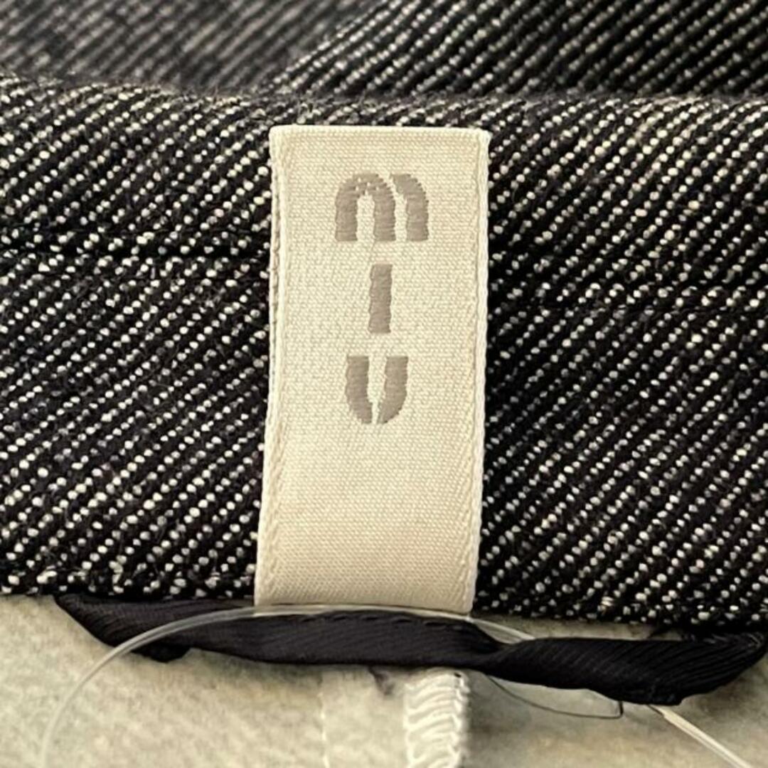 miumiu(ミュウミュウ)のmiumiu(ミュウミュウ) コート サイズ44 L レディース美品  - ダークネイビー 長袖/春/秋 レディースのジャケット/アウター(その他)の商品写真