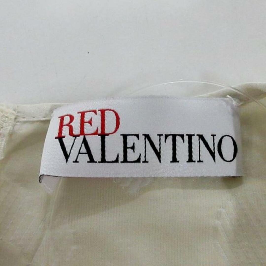 RED VALENTINO(レッドヴァレンティノ)のRED VALENTINO(レッドバレンチノ) ワンピース サイズ38 M レディース美品  アイボリー×白 ノースリーブ/ひざ丈 レディースのワンピース(その他)の商品写真