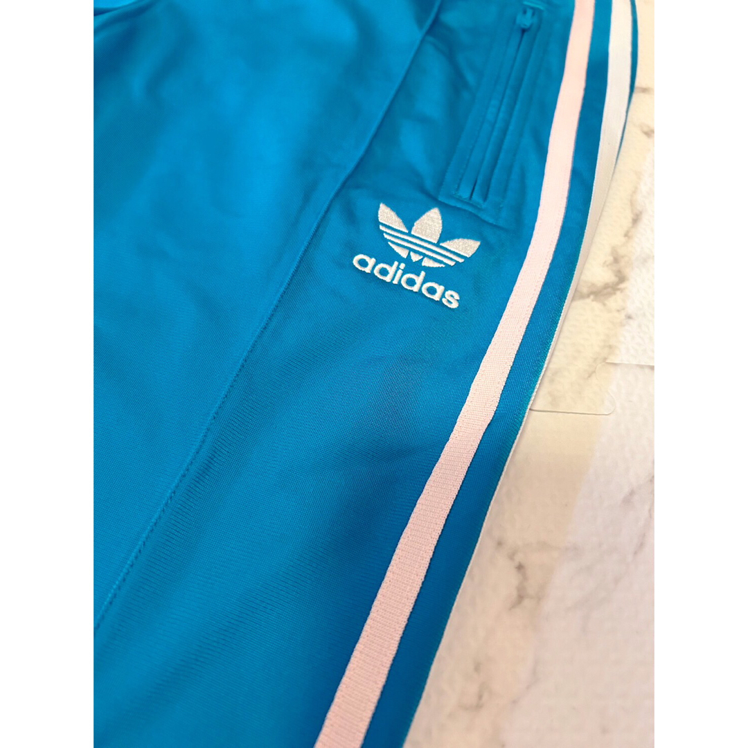 Originals（adidas）(オリジナルス)の adidas アディダス　タグ付き　レア　トラックパンツ　ターコイズブルー スポーツ/アウトドアのトレーニング/エクササイズ(トレーニング用品)の商品写真