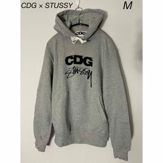 コムデギャルソン(COMME des GARCONS)の【希少】 CDG × STUSSY 両面ロゴパーカー ギャルソン (パーカー)