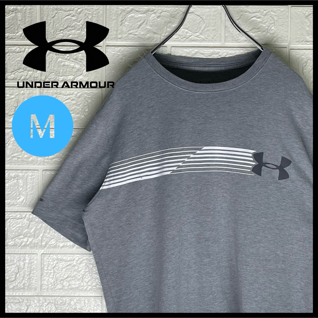 UNDER ARMOUR(アンダーアーマー)のアンダーアーマー　ワンポイントロゴ入り　Tシャツ　グレー　Mサイズ メンズのトップス(Tシャツ/カットソー(半袖/袖なし))の商品写真