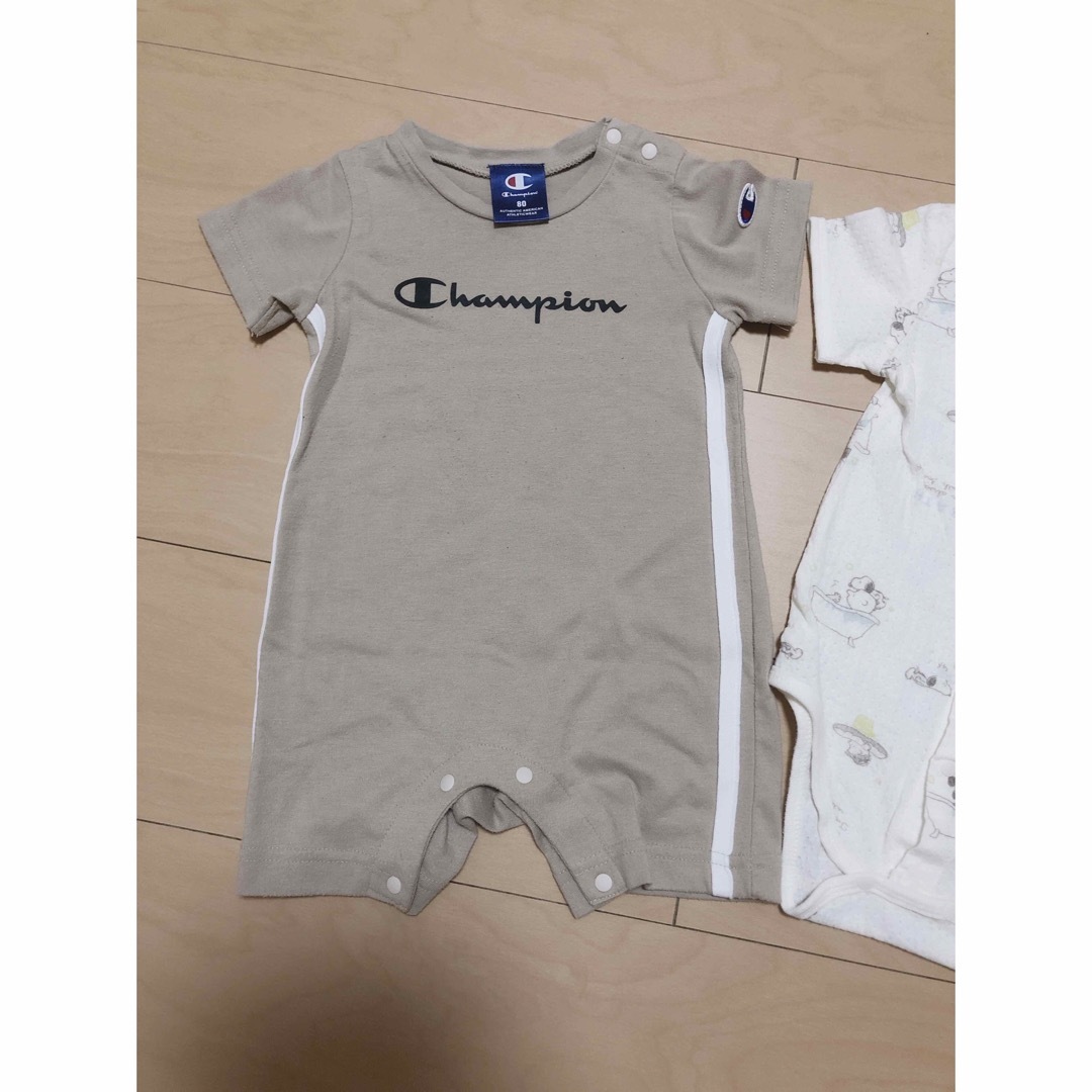 Champion(チャンピオン)のベビーザラス　SNOOPY、Champion80半袖ロンパース　2枚セット キッズ/ベビー/マタニティのベビー服(~85cm)(ロンパース)の商品写真