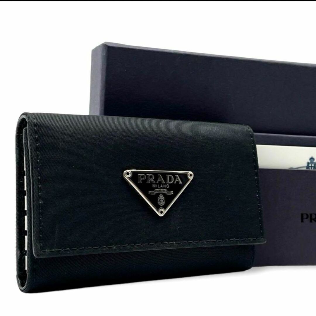 新品 PRADA レザー 6連キーケース 黒 ゴールドロゴ - 小物 新品 PRADA レザー 6連キーケース 黒 ゴールドロゴ - 小物