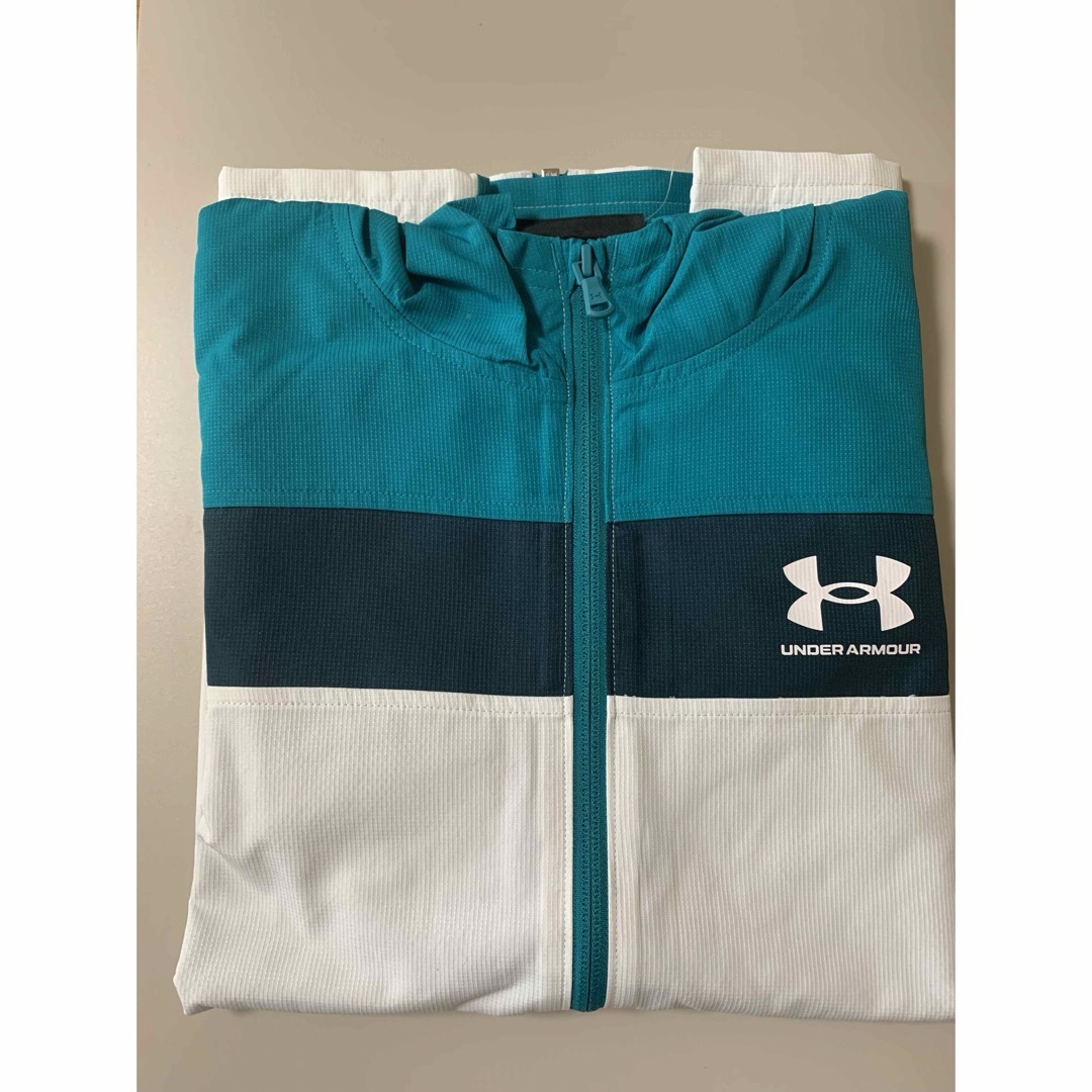 UNDER ARMOUR(アンダーアーマー)の新品タグ付き　 アンダーアーマー　ウィンドブレーカー 定価6050円 キッズ/ベビー/マタニティのキッズ服女の子用(90cm~)(ジャケット/上着)の商品写真