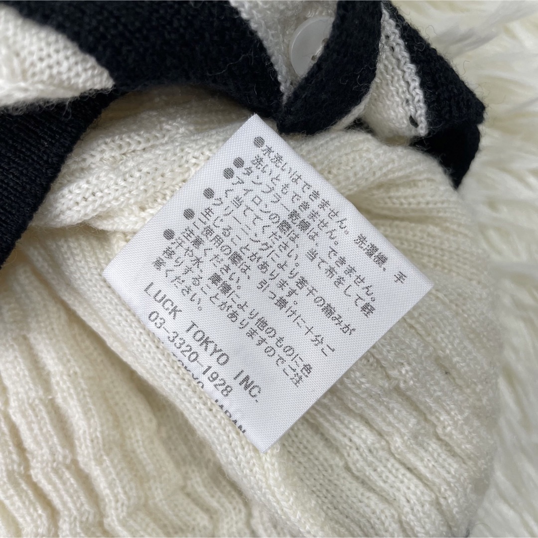 OBLI(オブリ)のOBLI オブリ ボウタイ カーディガン 白 黒 羽織り ニット リボン ライン レディースのトップス(カーディガン)の商品写真