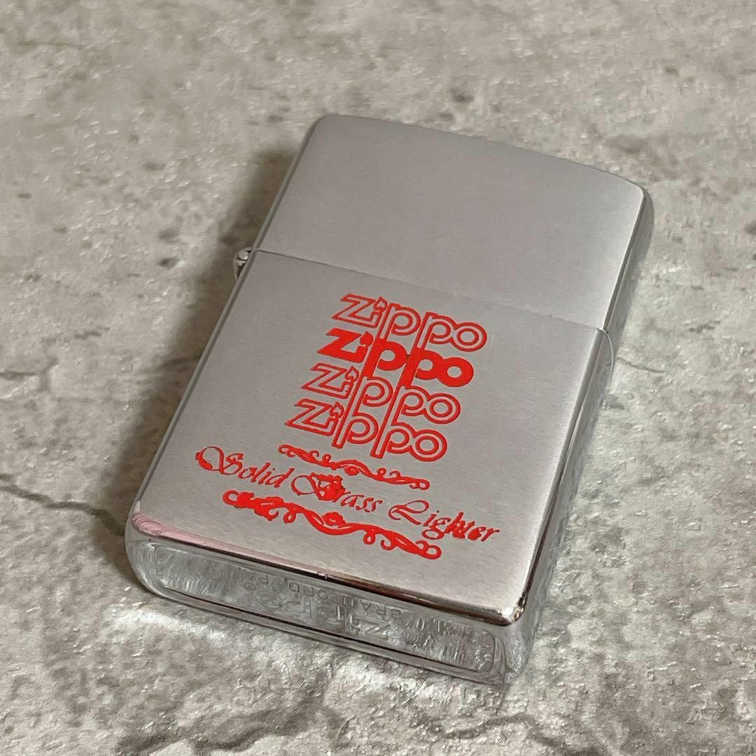 ZIPPO(ジッポー)の超希少 1983 ZIPPO ゴシック体 ロゴ 赤 レッド ジッポー ライター メンズのファッション小物(タバコグッズ)の商品写真