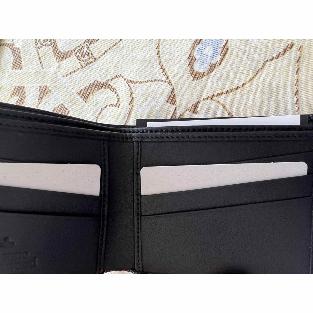 Vivienne Westwood(ヴィヴィアンウエストウッド)のヴィヴィアンウエストウッド  二つ折り財布　KENT MAN オーブ　新品 メンズのファッション小物(折り財布)の商品写真