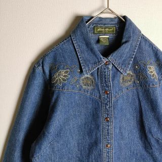 エディーバウアー(Eddie Bauer)の花刺繍 デニムシャツ 長袖 ウエスタン スナップボタン エディバウアー 古着(シャツ/ブラウス(長袖/七分))