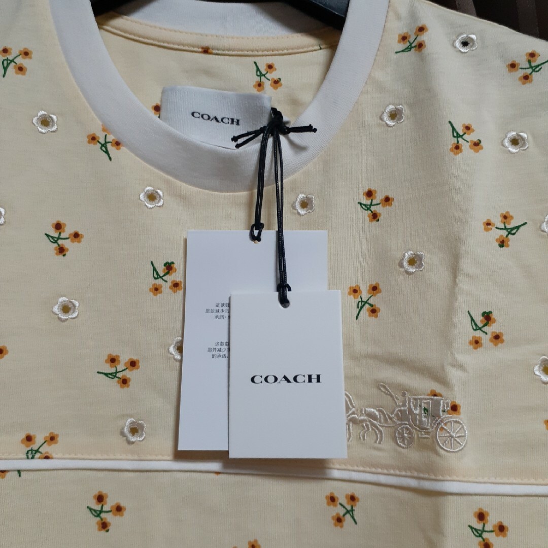 COACH(コーチ)の新品。COACHのオーガニックコットンの花柄Tシャツ レディースのトップス(Tシャツ(半袖/袖なし))の商品写真