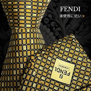 フェンディ(FENDI)のFENDI イタリア製 イエロー ダークネイビー ロゴ総柄(ネクタイ)