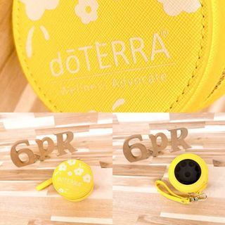 ドテラ(doTERRA)のレア/稀少【ドテラ】doTERRA 花柄 アロマ ケース ポーチ 黄×グレー(ポーチ)