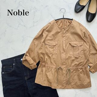 ノーブル(Noble)のNoble ノーブル　ノーカラージャケット　ブルゾン　オレンジベージュ　M(ノーカラージャケット)