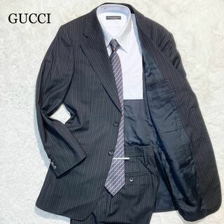 グッチ(Gucci)の【未使用級】GUCCI グッチ スーツ ブラック 黒 ストライプ ウール 44R(セットアップ)