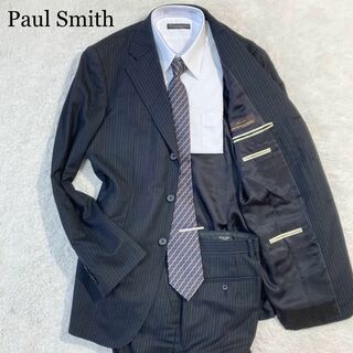 ポールスミス(Paul Smith)の【未使用級】ポールスミス スーツ カノニコ 黒 ブラック ストライプ XL(セットアップ)