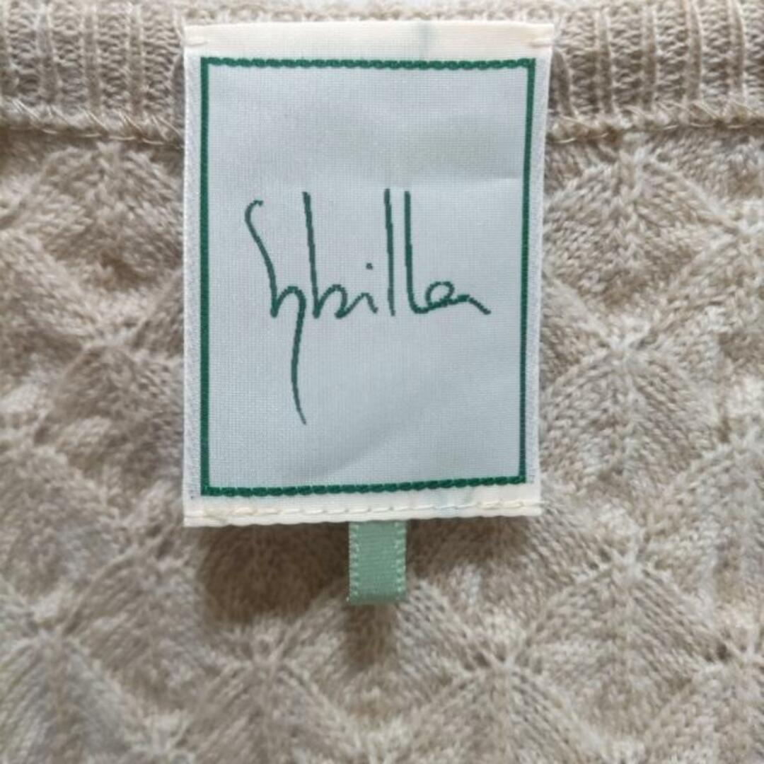 Sybilla(シビラ)のSybilla(シビラ) ワンピース サイズM レディース美品  - ベージュ クルーネック/半袖/ひざ丈/ニット レディースのワンピース(その他)の商品写真