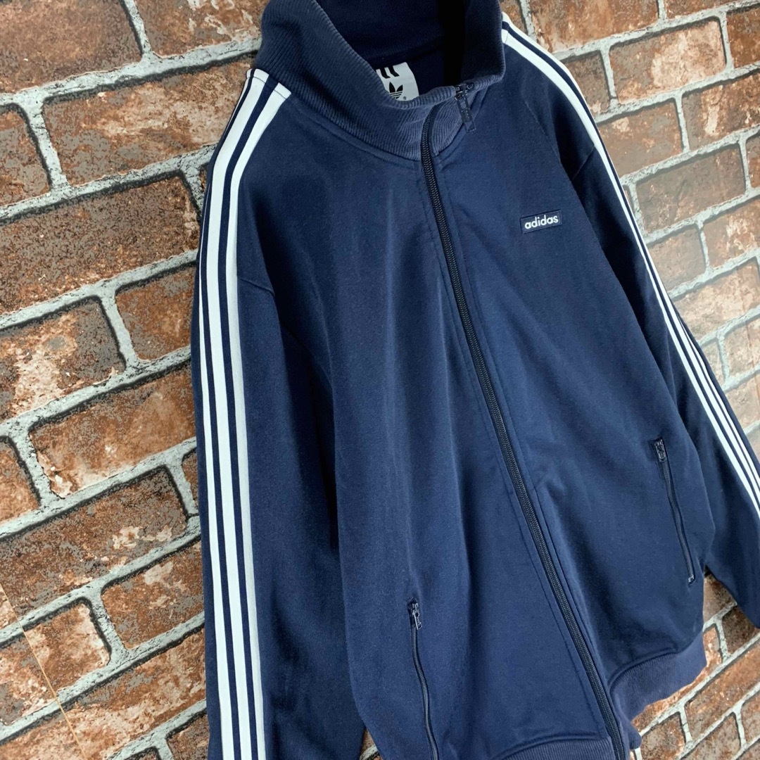 adidas(アディダス)の【即完売】アディダス　ワンポイント　スリーブライン　ネイビー　トラックジャケット メンズのトップス(ジャージ)の商品写真