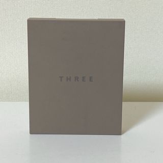 スリー(THREE)のTHREE シマリンググローデュオ　X02(フェイスカラー)