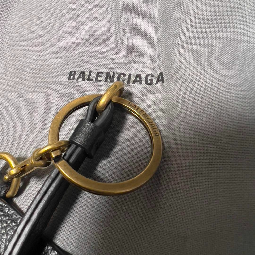 Balenciaga(バレンシアガ)の新品 BALENCIAGA バレンシアガ フラグメントケース 594548 金黒 メンズのファッション小物(コインケース/小銭入れ)の商品写真