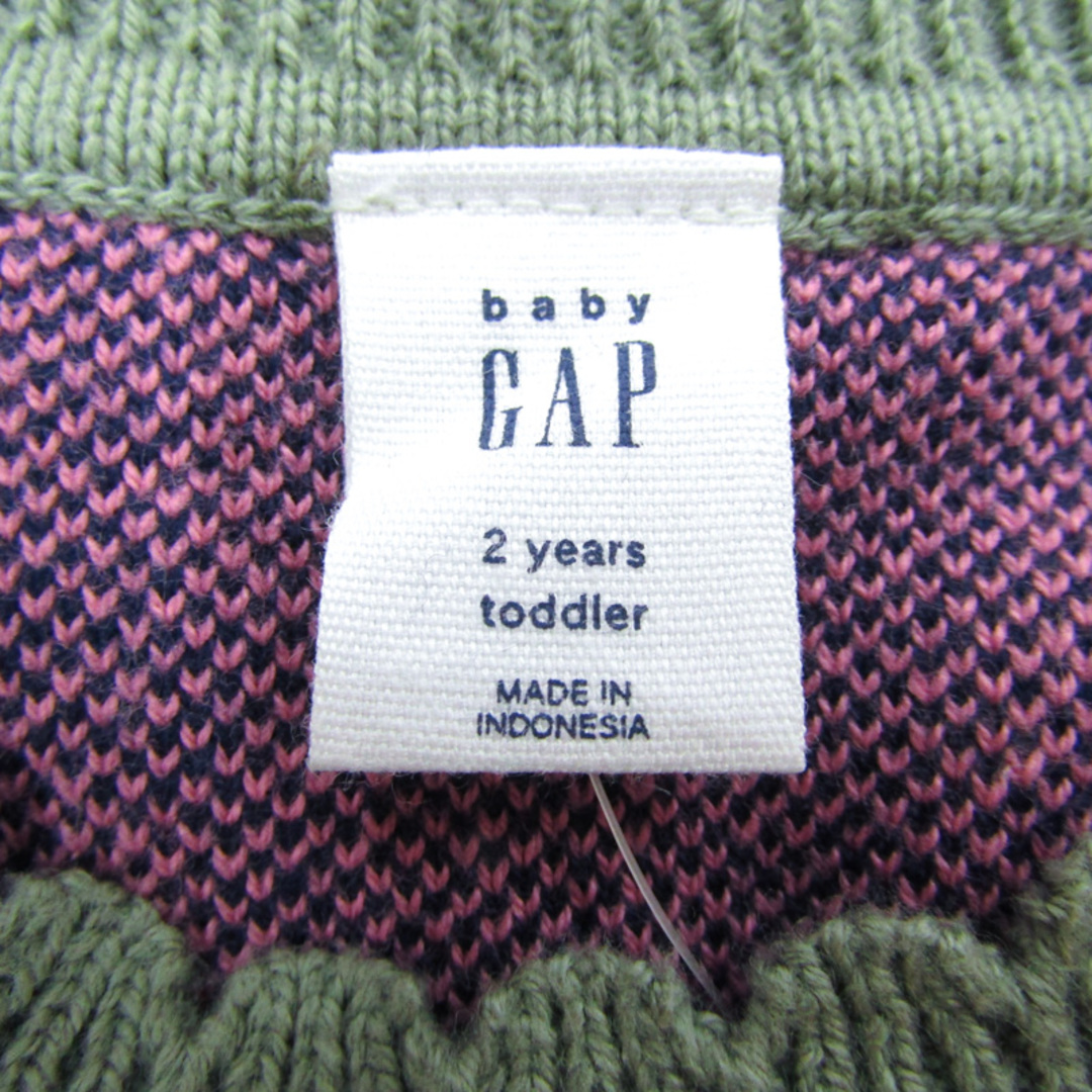 GAP(ギャップ)のギャップ 長袖セーター リンゴ柄 未使用品 ベビー 女の子用 95サイズ グリーン×ピンク GAP キッズ/ベビー/マタニティのベビー服(~85cm)(ニット/セーター)の商品写真