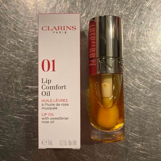 クラランス(CLARINS)のクラランス 新品　リップコンフォートオイル #01 ハニー 7ml(リップグロス)