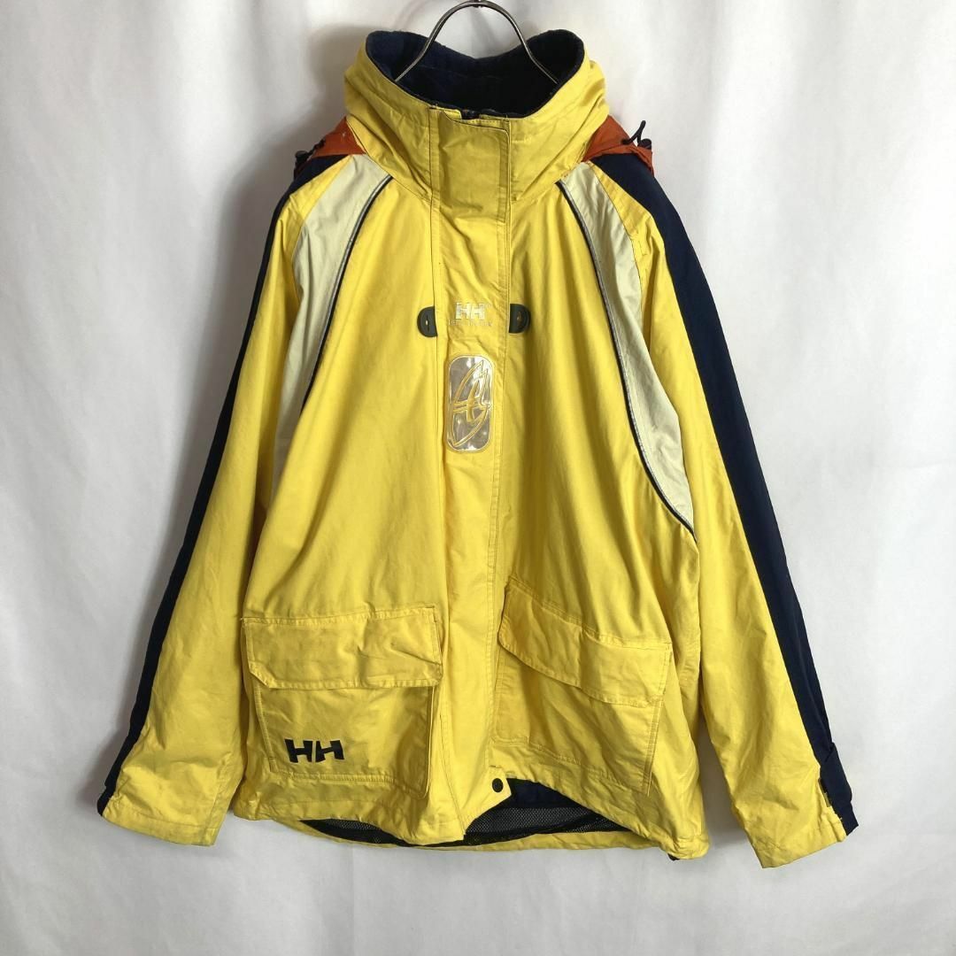 HELLY HANSEN(ヘリーハンセン)の古着ヘリーハンセン セーリングジャケット ナイロン ワンポイントロゴ 黄色XL メンズのジャケット/アウター(ナイロンジャケット)の商品写真