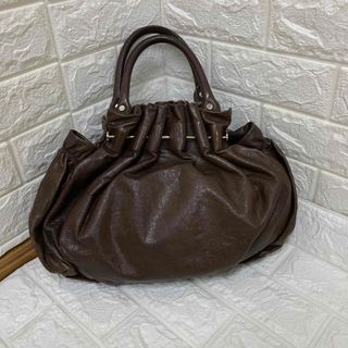 マルニ(Marni)のMARNI  マルニ   牛革　ブラウン レザー  シャーリング ハンドバッグ(ハンドバッグ)