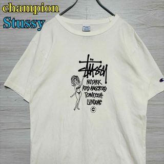 ステューシー(STUSSY)の【人気コラボ】ステューシー × チャンピオン　Tシャツ　Lサイズ　センターロゴ(Tシャツ/カットソー(半袖/袖なし))