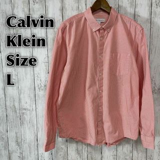 カルバンクライン(Calvin Klein)のＣＫカルバンクライン　オレンジギンガムチェック　ＢＤ長袖シャツ　薄手　メンズ古着(シャツ)