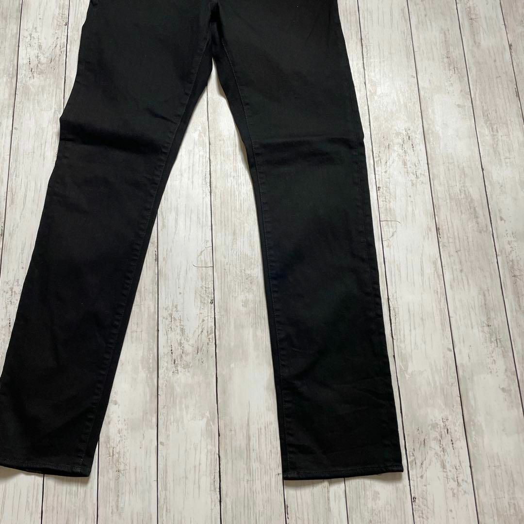 ARMANI EXCHANGE(アルマーニエクスチェンジ)のアルマーニ　ストレッチデニム　Ｗ30Ｌ30　黒ブラックやや薄手　メンズ　古着 メンズのパンツ(デニム/ジーンズ)の商品写真