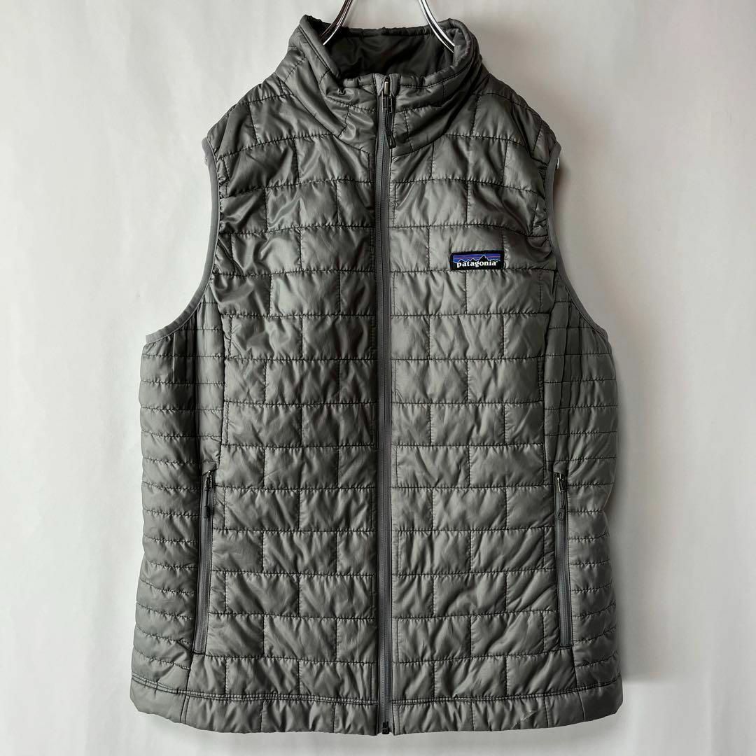 patagonia(パタゴニア)のパタゴニア　ナノパフ　ダウンベスト　グレー　Lサイズ　古着　プリマロフト レディースのジャケット/アウター(ダウンベスト)の商品写真