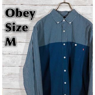 オベイ(OBEY)のOBEYオベイ　ＢＤ長袖シャツ　紺色系　ストライプ　切り返し　薄手　メンズ古着(シャツ)