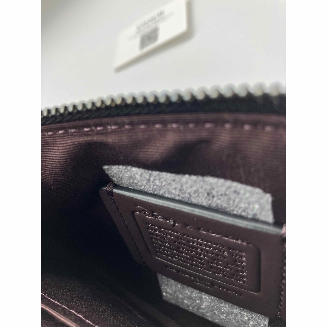 COACH(コーチ)の☆正規品　COACH【CN041】ウインクミッキー  ジップ リストレット レディースのファッション小物(ポーチ)の商品写真