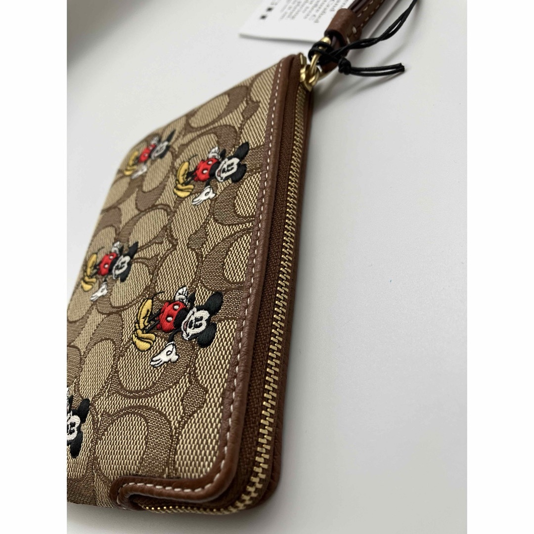 COACH(コーチ)のCOACH【CN033】Disneyコラボ　コーナー ジップ リストレット レディースのファッション小物(ポーチ)の商品写真