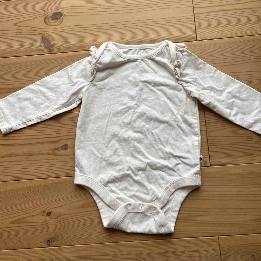 babyGAP(ベビーギャップ)のGAP 白フリルロンパース キッズ/ベビー/マタニティのベビー服(~85cm)(ロンパース)の商品写真