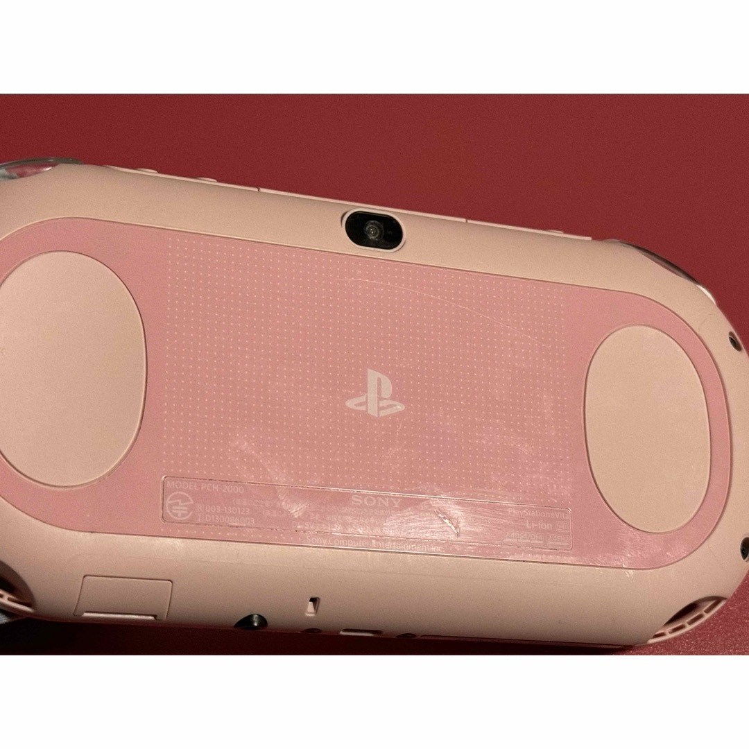 PlayStation Vita(プレイステーションヴィータ)のvita   ライトピンク　水没系　重度のジャンク エンタメ/ホビーのゲームソフト/ゲーム機本体(携帯用ゲーム機本体)の商品写真