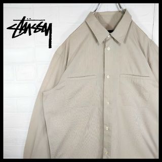 ステューシー(STUSSY)の【STUSSY】90s' USA製 紺タグ　ストライプ　コットン　長袖シャツ(シャツ)