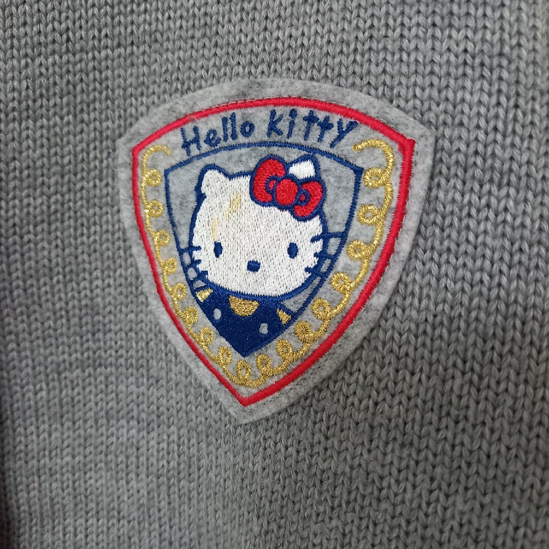 サンリオ(サンリオ)のHELLO KITTY ハローキティ カーディガン 古着 ねずみ色 赤 古着 レディースのトップス(カーディガン)の商品写真