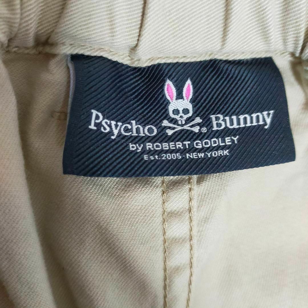 Psycho Bunny(サイコバニー)のサイコバニー ゴルフウェア ゴルフパンツ メンズ ベージュ チノパン プリントS スポーツ/アウトドアのゴルフ(ウエア)の商品写真