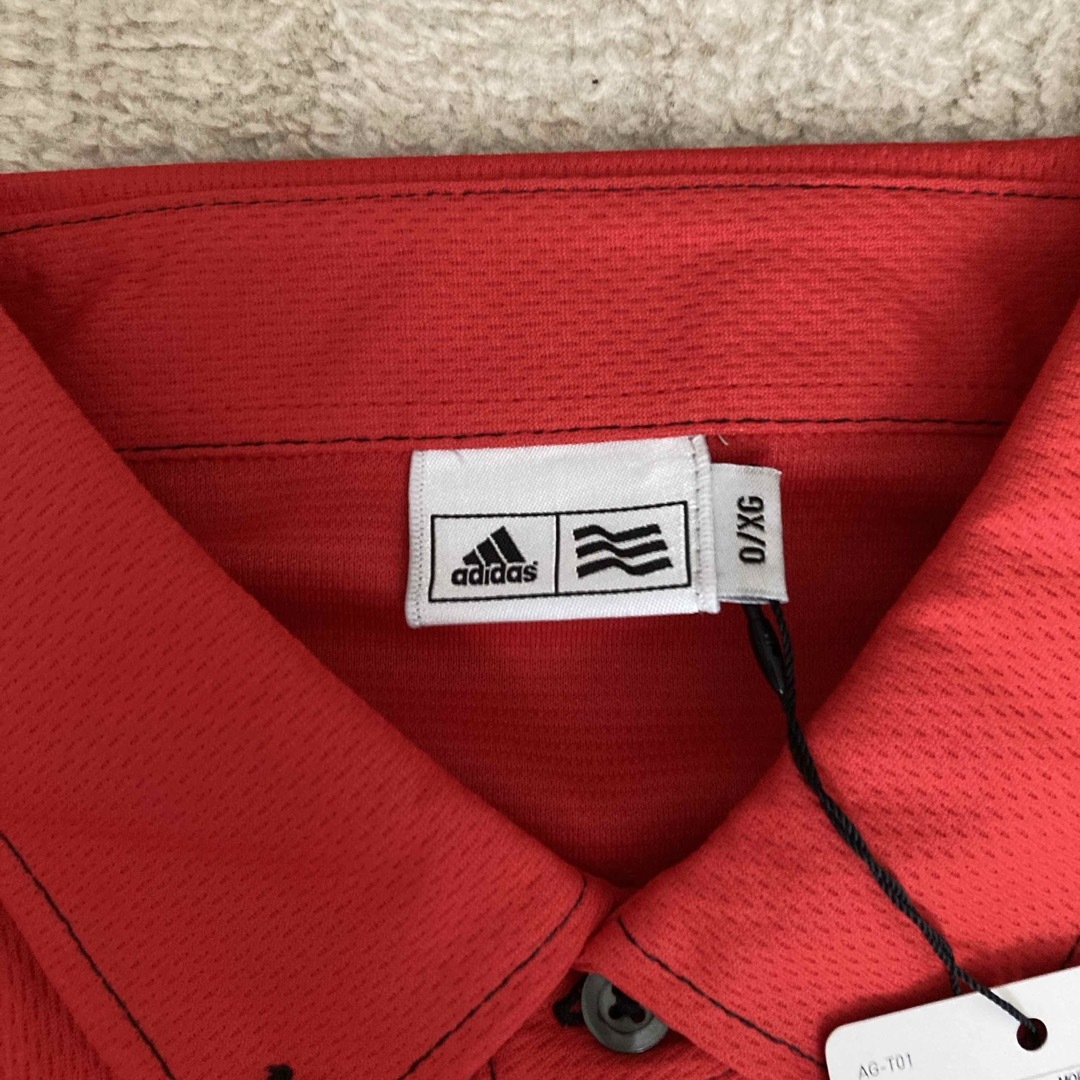 adidas(アディダス)の値下げ　新品未使用　adidas 半袖　REDウェア スポーツ/アウトドアのゴルフ(ウエア)の商品写真