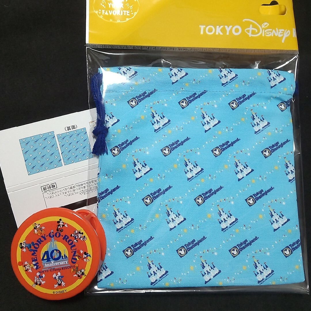 Disney(ディズニー)のDisney　マスキングテープ 巾着　メイクユアフェイバリット　40周年 エンタメ/ホビーのおもちゃ/ぬいぐるみ(キャラクターグッズ)の商品写真