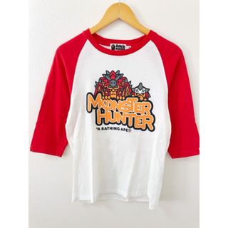 アベイシングエイプ(A BATHING APE)のA BATHING APE（アベイシングエイプ）BABY MILO MONSTER HUNTERコラボ　ラグラン七分Tシャツ【E2482-007】(Tシャツ/カットソー(七分/長袖))