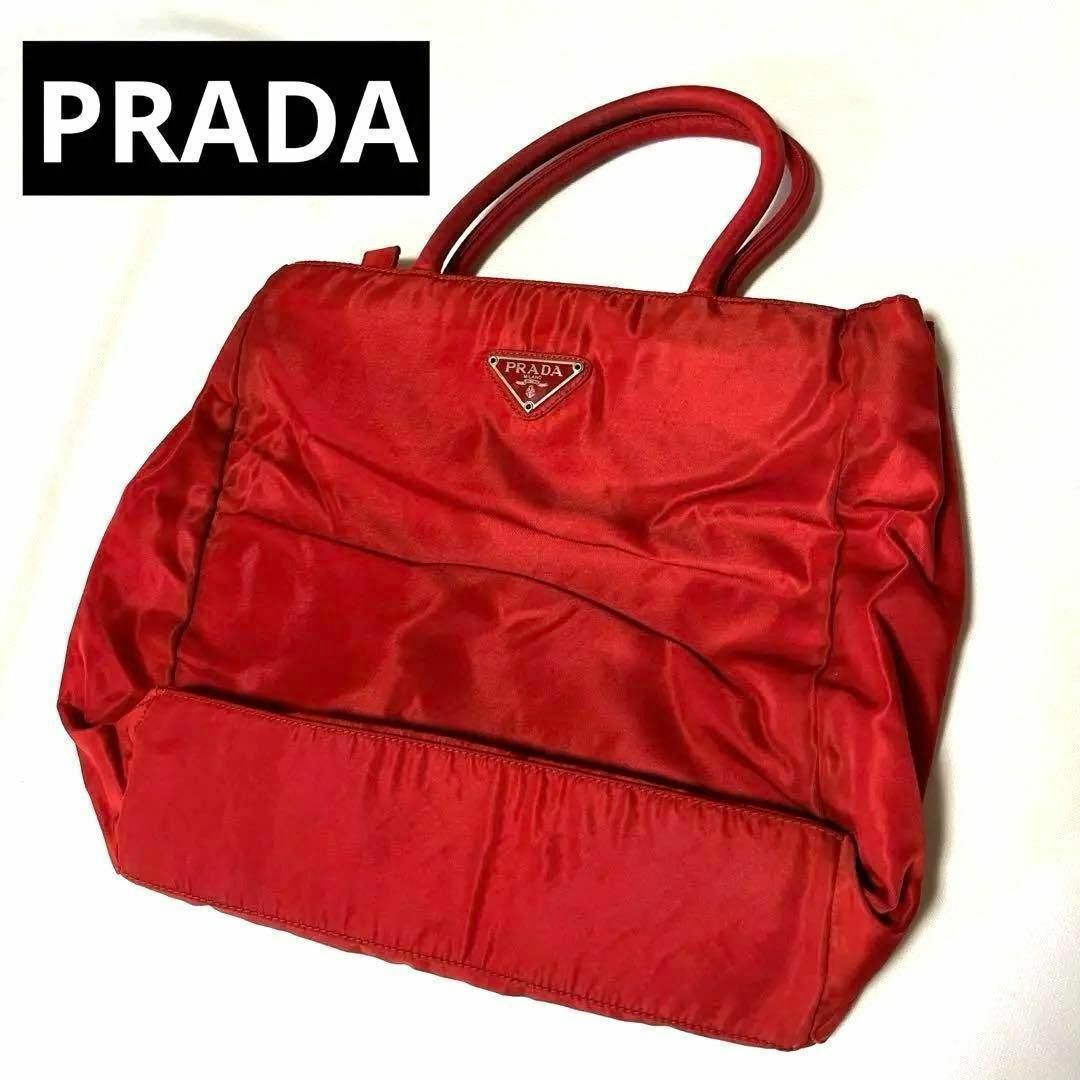 PRADA(プラダ)のPRADA プラダ ナイロン ハンドバッグ 赤 レッド色あせ 中古 トートバッグ レディースのバッグ(ハンドバッグ)の商品写真