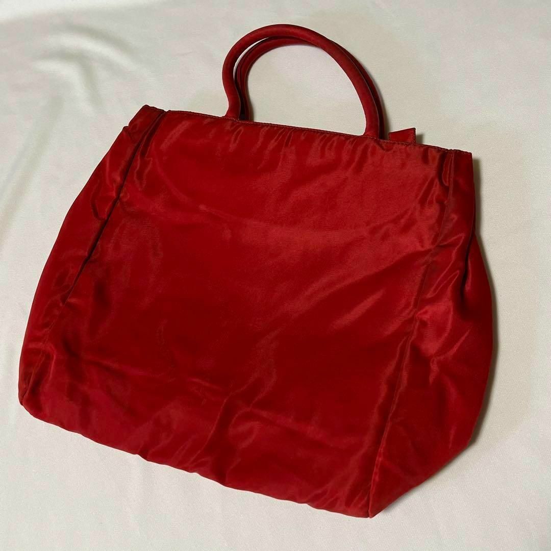 PRADA(プラダ)のPRADA プラダ ナイロン ハンドバッグ 赤 レッド色あせ 中古 トートバッグ レディースのバッグ(ハンドバッグ)の商品写真