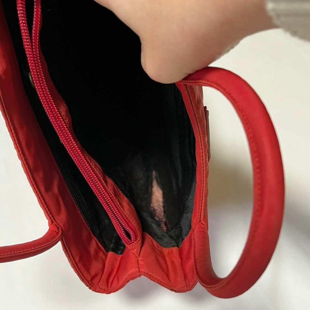 PRADA(プラダ)のPRADA プラダ ナイロン ハンドバッグ 赤 レッド色あせ 中古 トートバッグ レディースのバッグ(ハンドバッグ)の商品写真